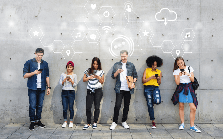 A group of people using their phone