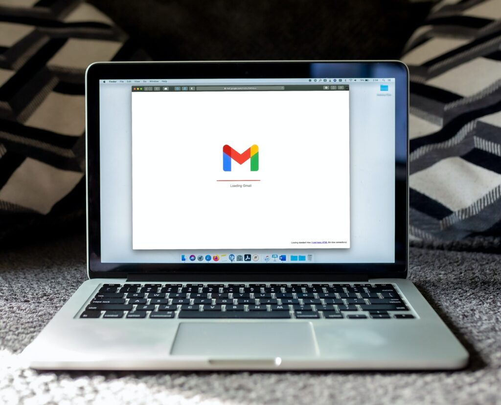 A laptop showing Gmail icon